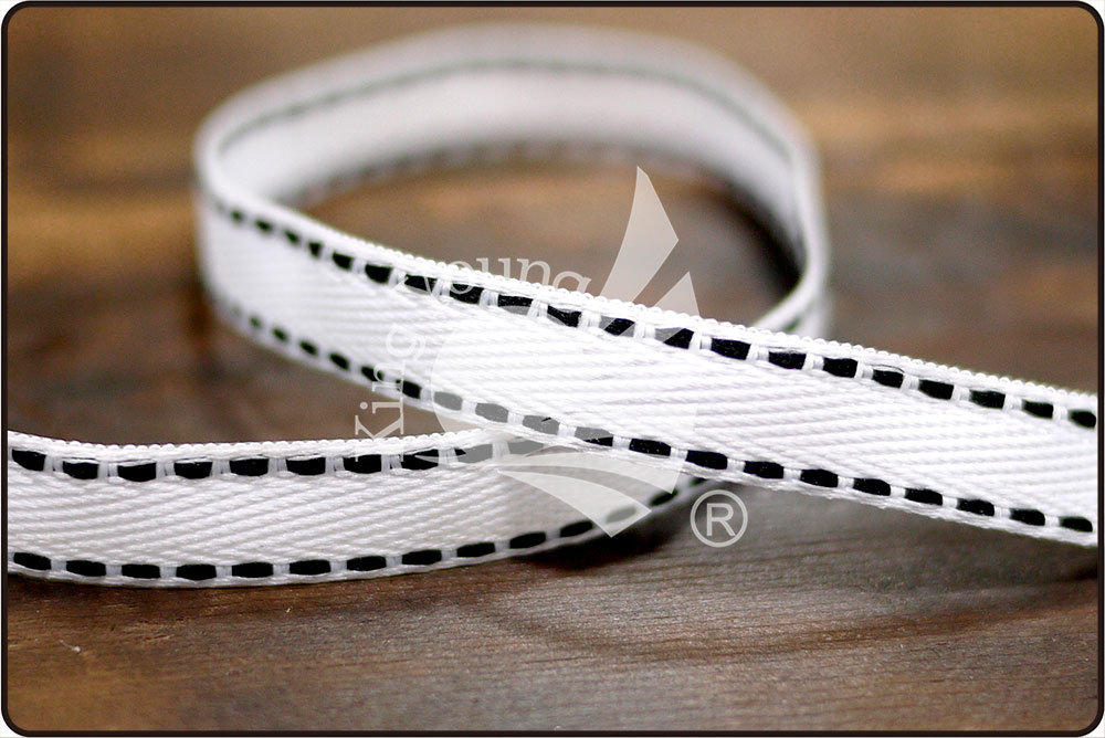 साइड स्टिचिंग के साथ संकीर्ण ट्विल रिबन