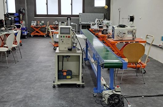 Automated production line for precision wiring harness and cable assembly