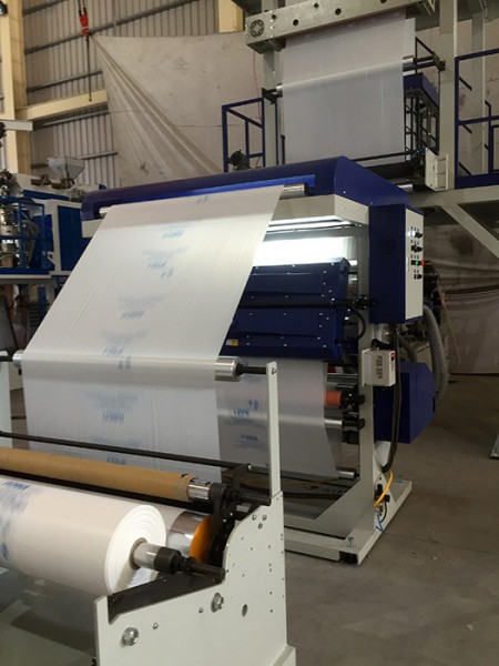풍화 필름 기계와 연결되는 인쇄 기계
