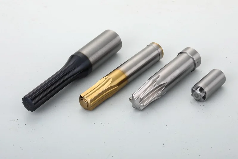 A set of precision screw forming tools with advanced PVD/CVD surface treatment for enhanced durability and performance.