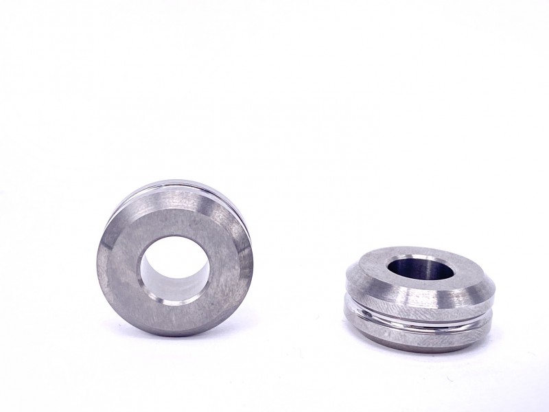 High-precision tungsten carbide roller components for mechanical applications, showcasing superior material finish.