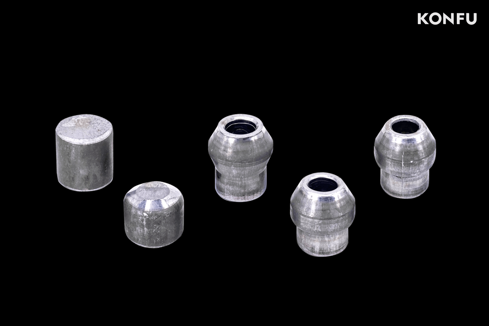 An organized display of five different metallic parts from a KONFU cold forging tool set.