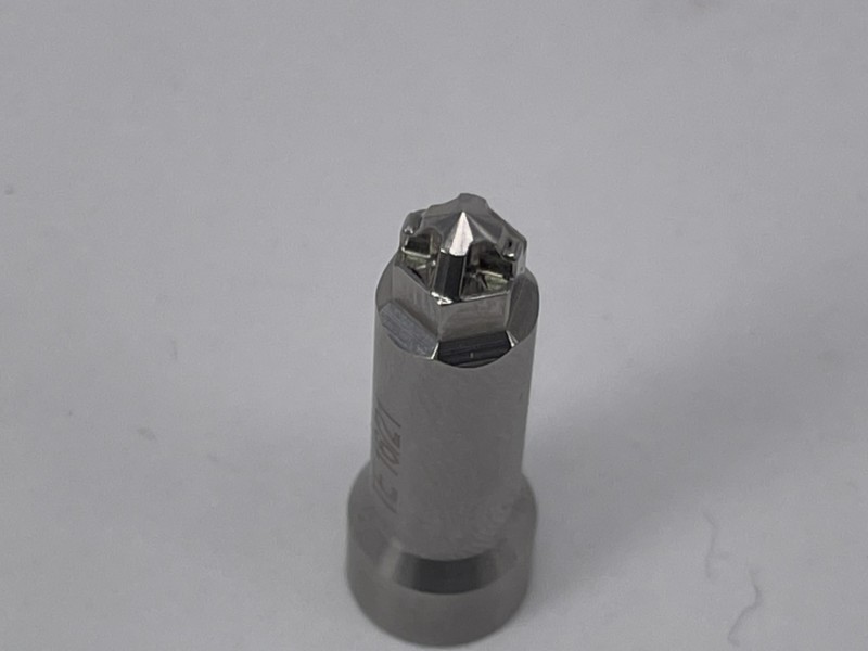 Close-up of a precision-engineered Carbide Pozi Pin Punch tip from KONFU's fastener forming tools line.