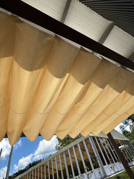Wave-Shaped Sail Shade for Communal Leisure Space
