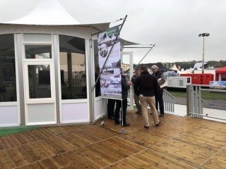 Lightweight Glass Wall Tents with Elevated Deck Systems in Myanmar International Convention Center