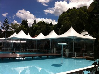 Poolside Lounge with High Peak Cross Cable Tent