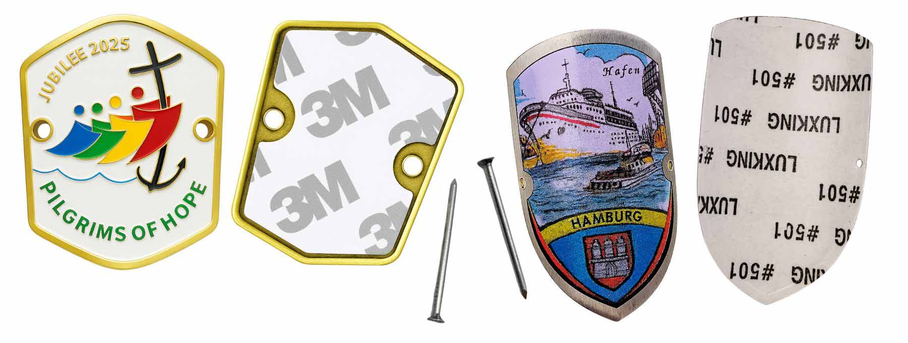 Custom metal badges for the Jubilee 2025, themed 'Pilgrims of Hope', showcasing intricate designs.