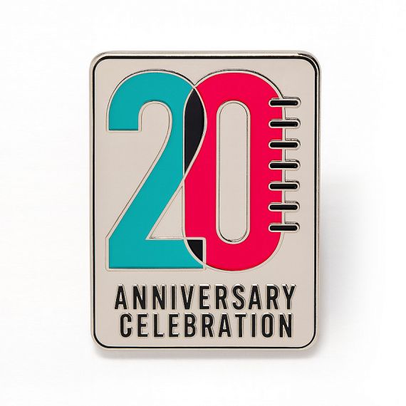 Custom 20th anniversary enamel pin with modern color contrast and clean, contemporary styling.