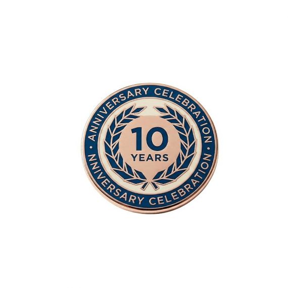 Custom-made 10th anniversary celebration enamel lapel pin with rose gold plating.