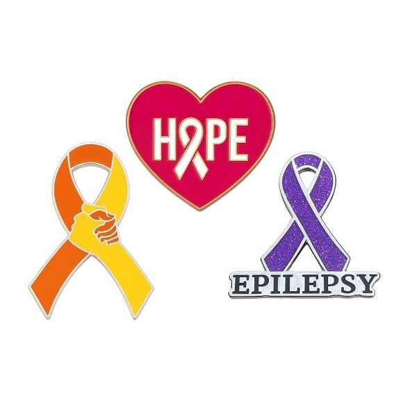 Custom awareness ribbon pins with unique shapes and messages, representing hope and support for various causes.