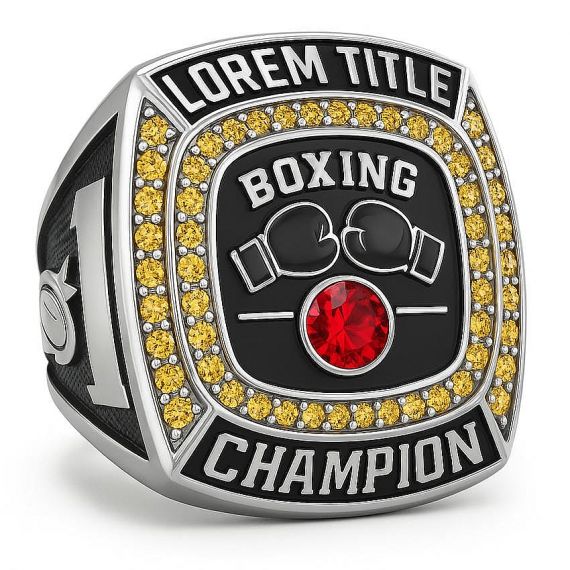 Silver boxing champion ring with black enamel face, gold stones, and a red center gem