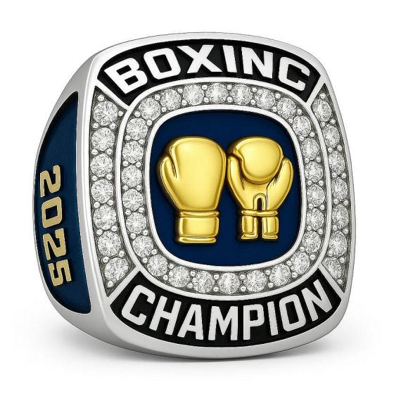 Silver 2025 boxing champion ring with gold boxing gloves and a crystal-encrusted bezel