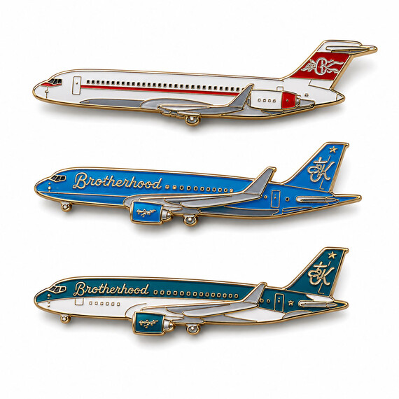 Custom enamel aircraft-shaped airline lapel pins in multiple color designs.
