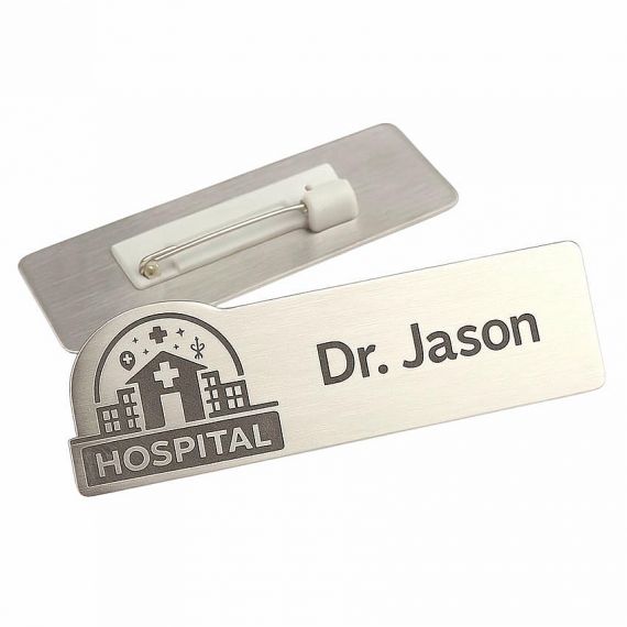 Custom-shaped aluminum name tags with logo-contoured top edges for hospitals; precision-cut metal badges from Vietnam factory.