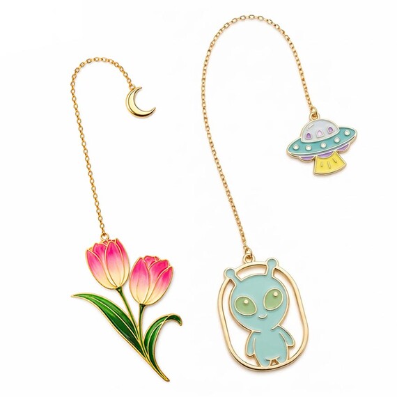 Custom Enamel Chain Bookmarks - Custom set of tulip flower and alien UFO enamel bookmarks featuring delicate gold chains and moon pendants for gift shop supplies.