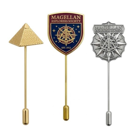 Custom Logo Lapel Stick Pins - Manufacturer Custom Metal Stick Pins featuring 3D Gold Pyramid, Magellan Explorers Society Enamel Shield, and Antique Silver Compass Designs
