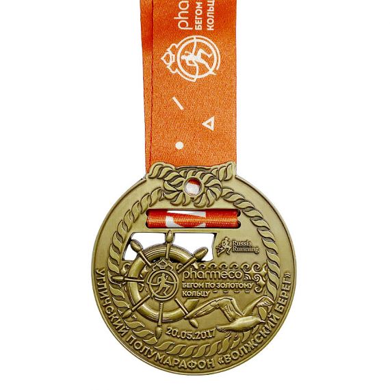 Antique gold custom metal finisher marathon medal with a 3D nautical theme and orange ribbon