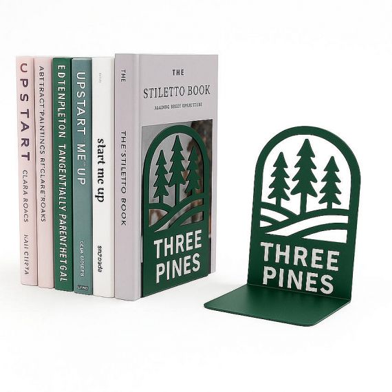 Customized "THREE PINES" forest silhouette metal bookends in matte green, personalized laser cut book holders for nature lovers.