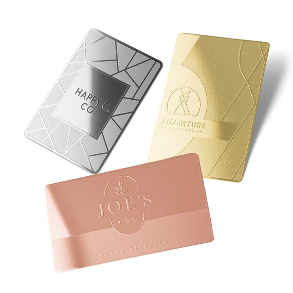 Custom Metal Business Cards - Customized luxury metal business cards in gold silver and rose gold finishes with etched geometric patterns for premium brand identity.