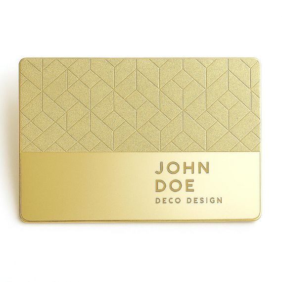 Personalized gold metal business card featuring sophisticated 3D cubic patterns and deep etched lettering for luxury real estate agents.