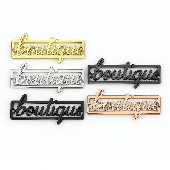 Rectangular frame "Boutique" script metal labels; professional hardware tags for upscale retail displays and furniture branding from Vietnam.