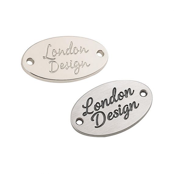 custom recessed soft enamel branded logo metal tags manufacturer