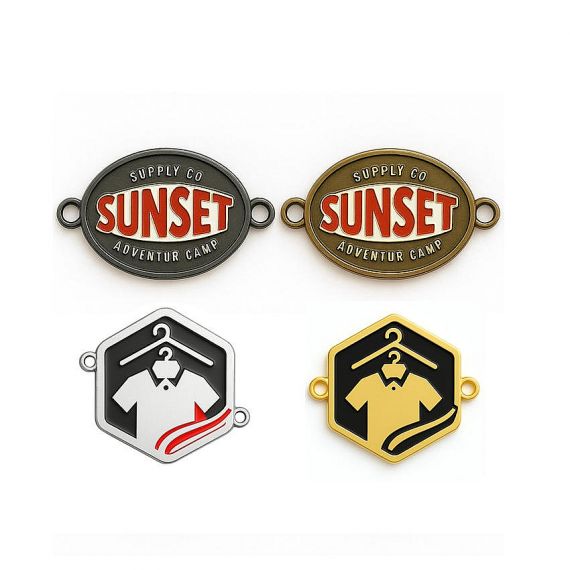 Oval and hexagonal enamel metal tags for "Sunset Adventure Camp" featuring sew-on holes; durable outdoor gear branding manufactured in Vietnam.
