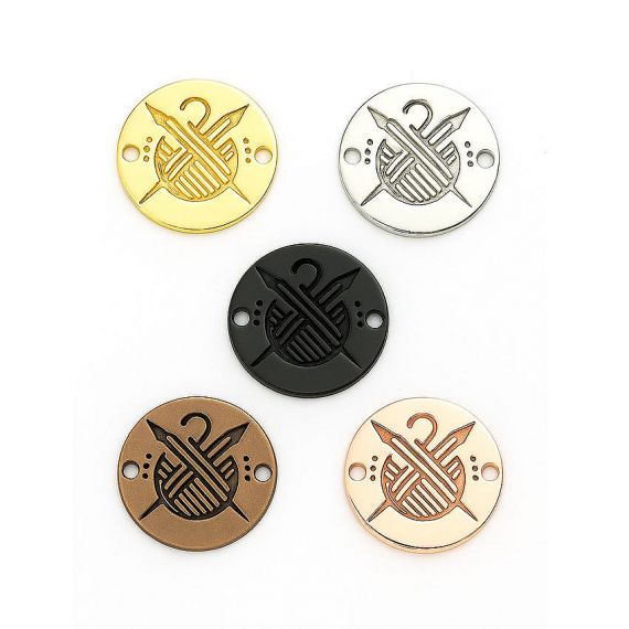 custom round recessed logo metal tags specialized branding for knitting and craft businesses.