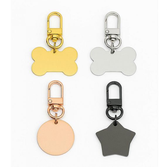 Blank metal pet ID tags in bone, round, and star shapes are shown with colorful lobster claw clasps, featuring gold, silver, rose gold, and black finishes.