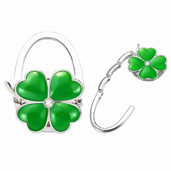 Custom four-leaf clover shaped foldable purse hooks with green enamel and crystal detail, premium zinc alloy bag hangers for tables with personalized design.