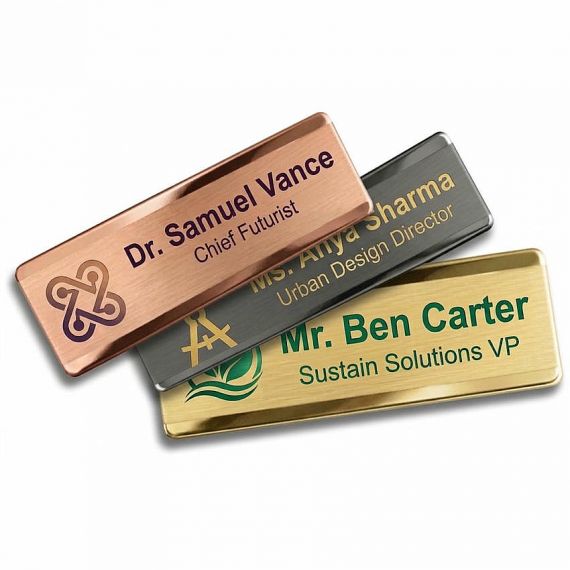 Premium executive stainless steel name badges in rose gold, gunmetal black, and polished gold finishes; high-end corporate ID tags, 500pcs MOQ.