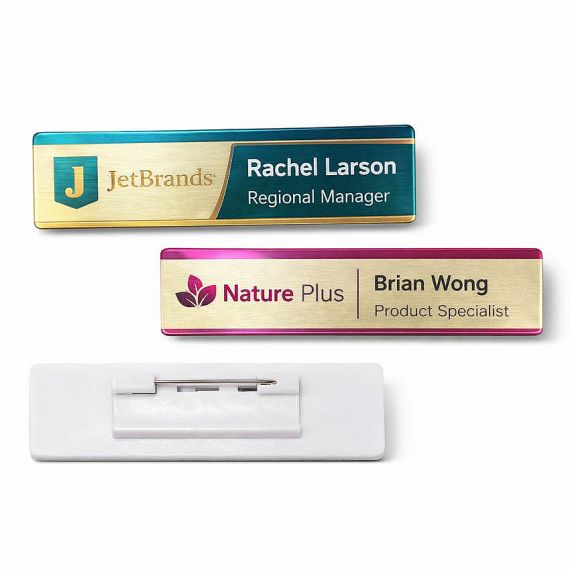Colorful custom-printed stainless steel name tags for regional managers; metal badges with vibrant teal and magenta borders, manufactured in Vietnam.