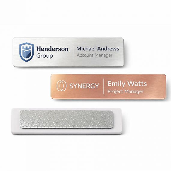 Minimalist stainless steel name badges in silver and copper tones; sleek metal staff tags for modern architectural and design firms.