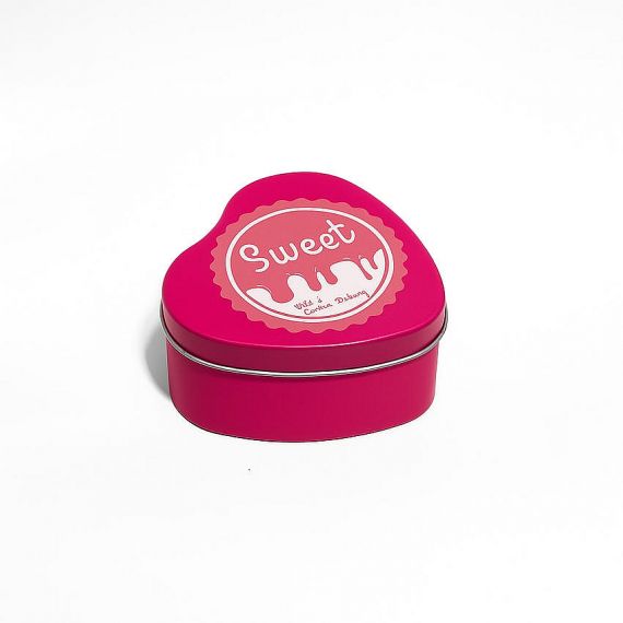 Heart-shaped custom metal tin box in vibrant pink with "Sweet" logo, personalized candy packaging and romantic gift tin manufacturer.