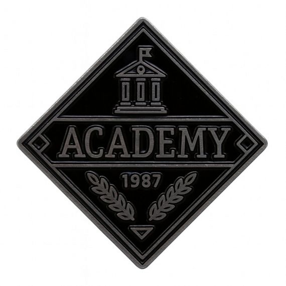 Black academy emblem pin with vintage institutional style