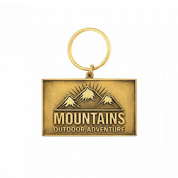 Stamped brass keychain with mountain design in antique gold plating, no enamel color