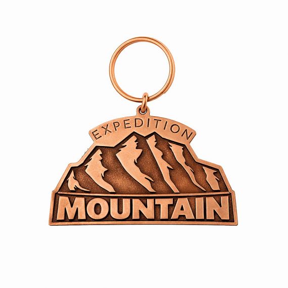 Durable antique copper brass keychain with a recessed stamped mountain logo