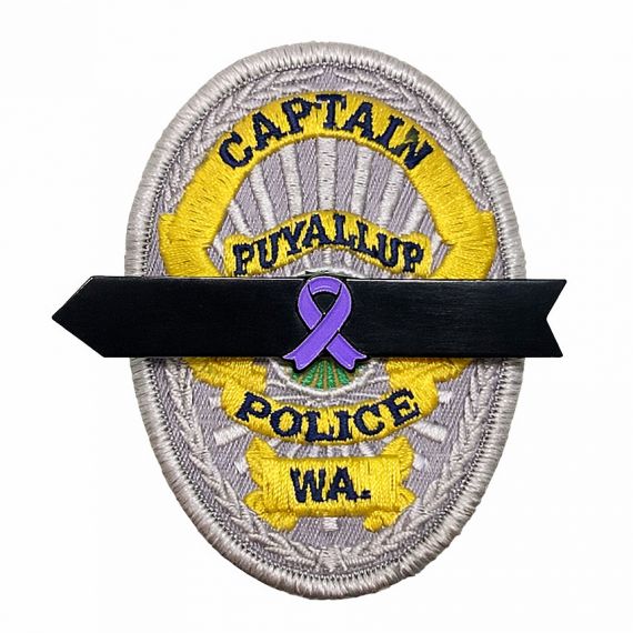 Black mourning band with purple ribbon on patch