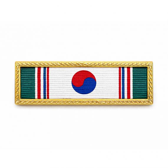 Korea themed military ribbon bar with gold plated frame and woven fabric finish