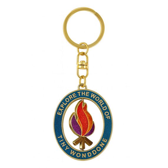 Spinning metal keychain with a rotating colorful campfire enamel pendant