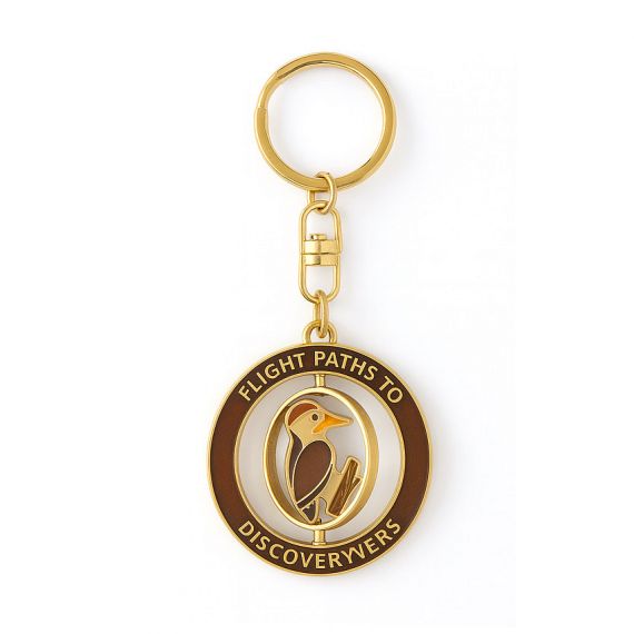 Interactive spin metal keychain featuring a rotating bird icon within a brown circular frame