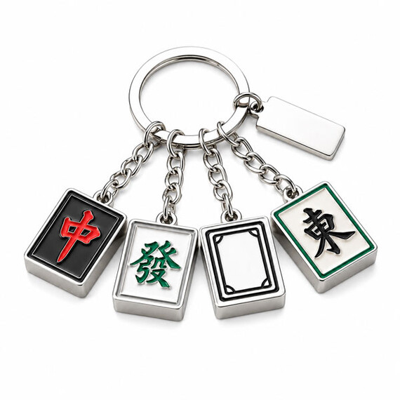 Silver-plated mahjong tile keychain with multiple enamel charms.
