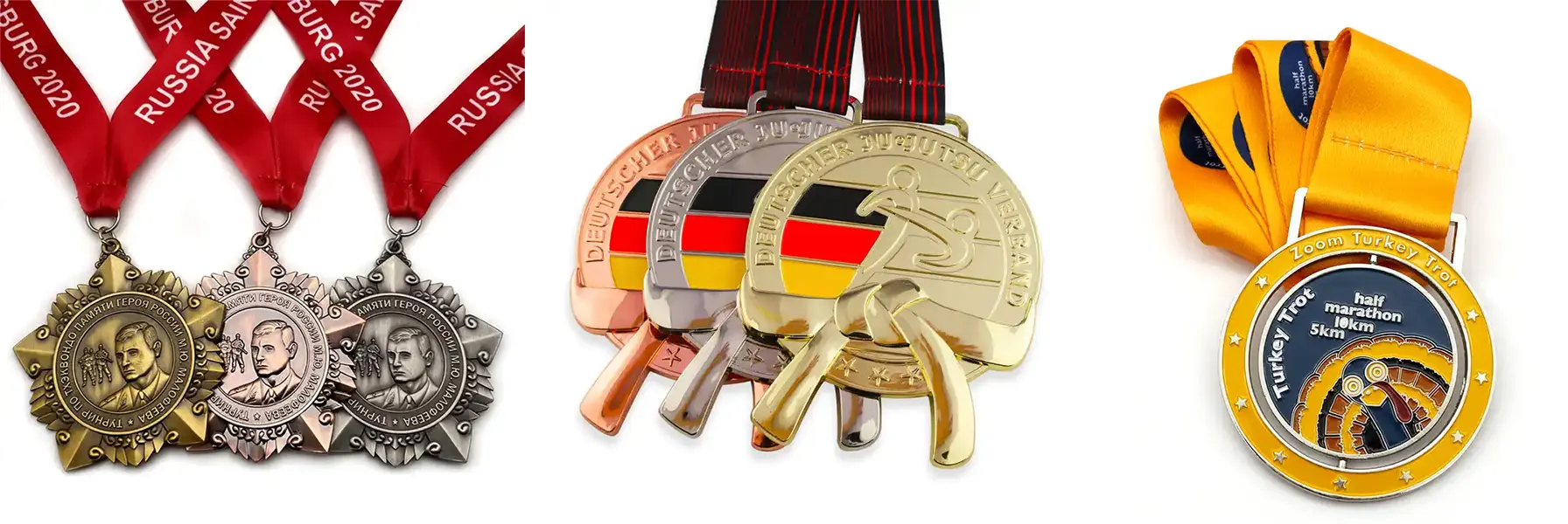 A wide banner image showcasing a diverse collection of sports medals with colorful ribbons from various events and countries.