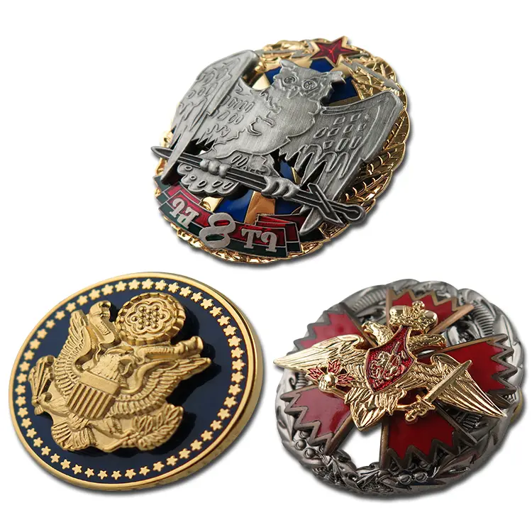 A collection of three distinct metal military-style badges with eagle designs, symbolizing honor and service.