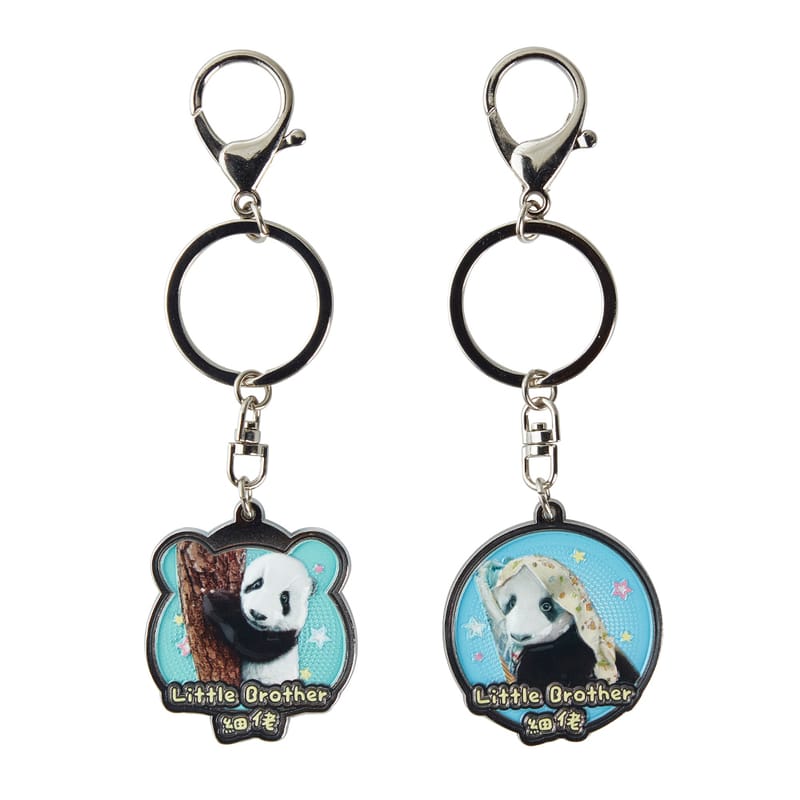 Two panda-themed custom metal keychains with different designs, showcasing durability and style.