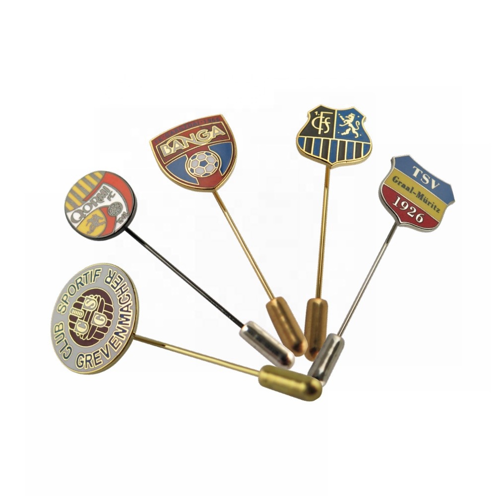 A collection of various custom sports team logo lapel pins, showcasing different designs and colors.