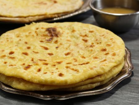 Flatbreads are automatically heat pressed
