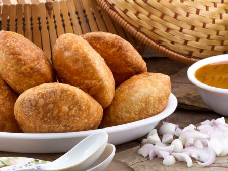 Kachori is tightly sealed on the edges and can be deep fried