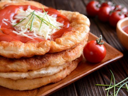 Langos made with highly efficient automated machinery