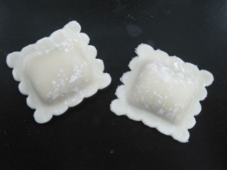 The square Ravioli are formed with patterns on all four edges